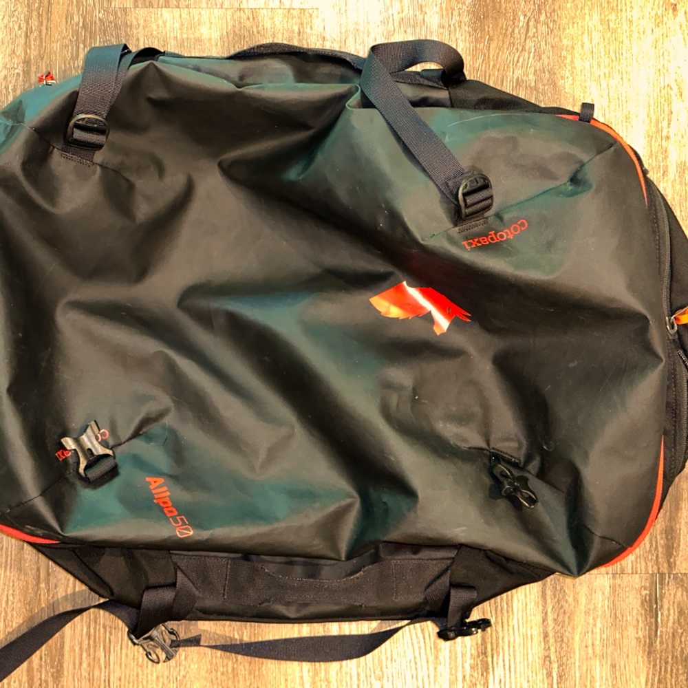 Cotopaxi Alpha 40 Liter travel bag. Dual-purpose backpack straps.